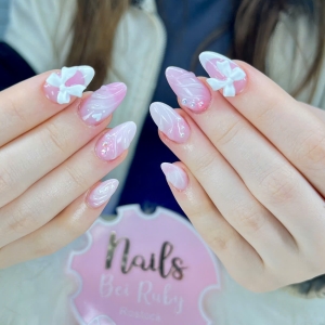 rosa-nails-mit-3d-schleifen-der-ultimative-trend-2025